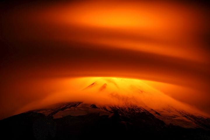The Villarrica Volcano is seen partially covered by clouds at Pucon