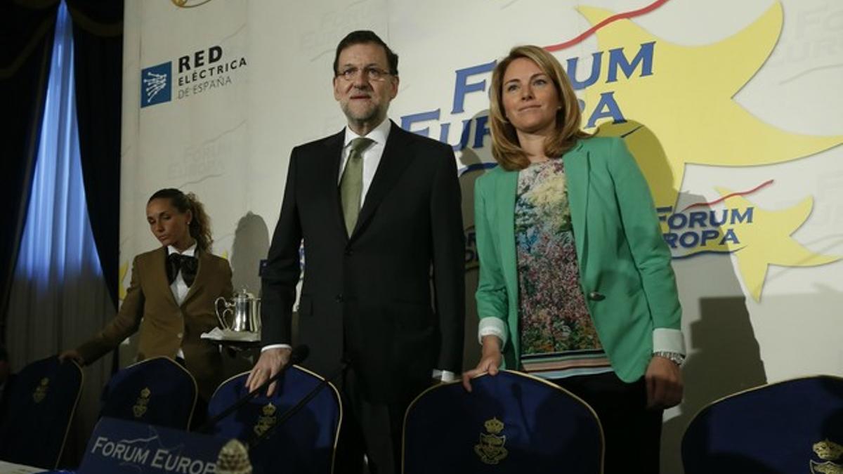 Mariano Rajoy y Arantza Quiroga, este lunes en un acto del Fórum Europa en Madrid.