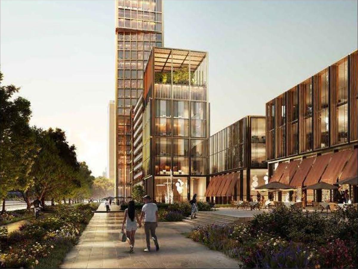 Recreación de la torre pendiente que Núñez i Navarro prevé construir, al fondo, y los otros nuevos edificios planificaDOS en la calle Tarragona, en Barcelona.