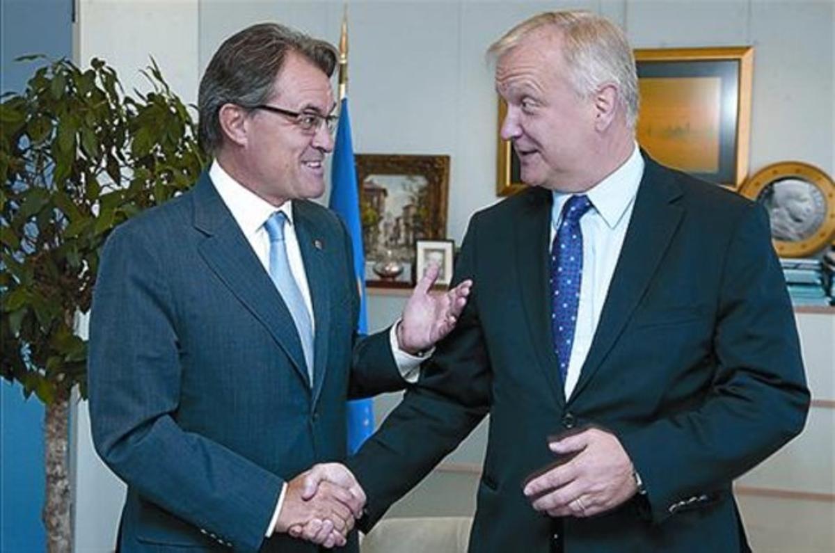 Artur Mas saluda el vicepresident econòmic de la CE, Olli Rehn. Artur Mas saluda el vicepresident econòmic de la CE, Olli Rehn.