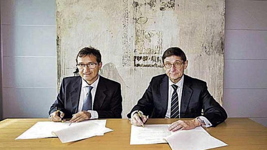 Jaime Canudas, de Sa Nostra, y José Ignacio Goirigolzarri, de Bankia.