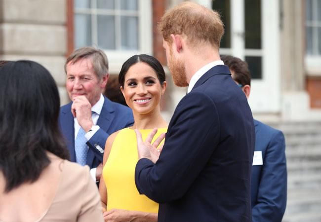 Meghan Markle y su marido, el príncipe Harry en una recepción de la Commonwealth