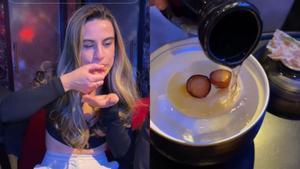 La influencer Ana, de anacocinargenial, prueba los cócteles del StreetXo de Dabiz Muñoz.