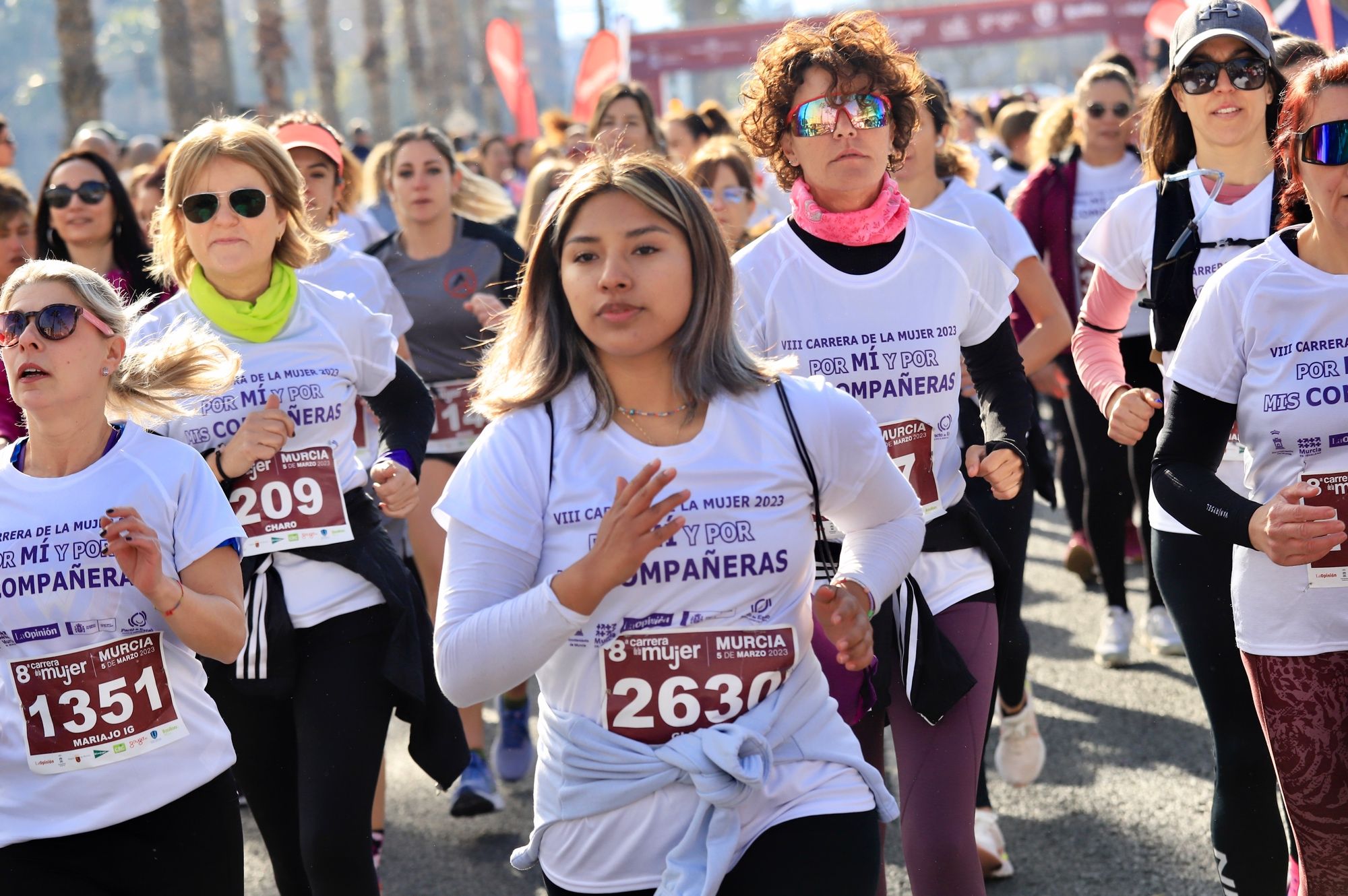 La salida y el recorrido de la Carrera de la Mujer 'inmortalizados' en imágenes