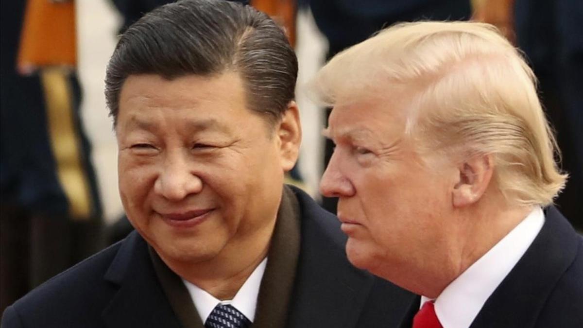 El presidente de China, Xi Jinping, y de EEUU, Donald Trump, durante un encuentro en Pekín.