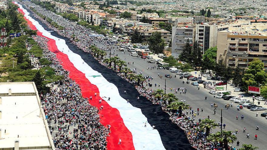 Multitudinària manifestació de suport al president sirià, Bachar al-Assad, a Damasc.