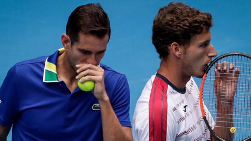 García-López y Carreño hablan durante el partido.