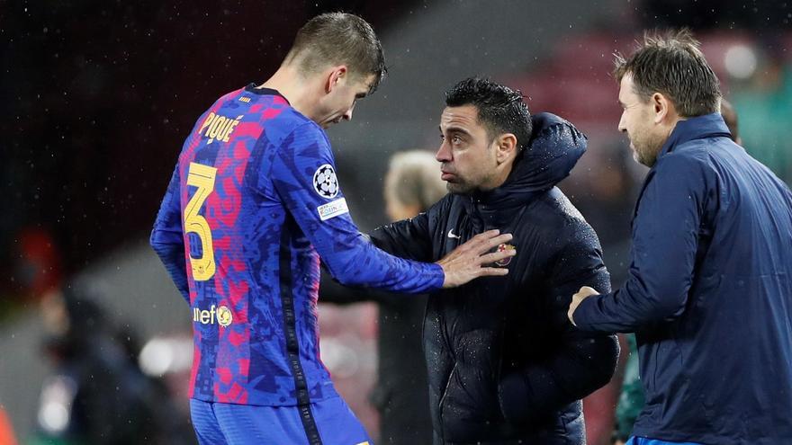 Una imagen de Xavi Hernández y Gerard Piqué.