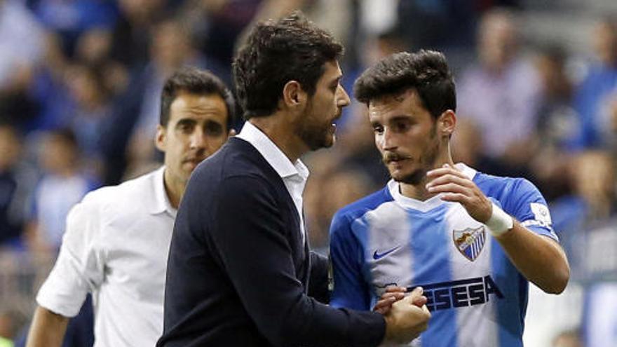 Víctor y Juankar, tras el cambio del lateral.