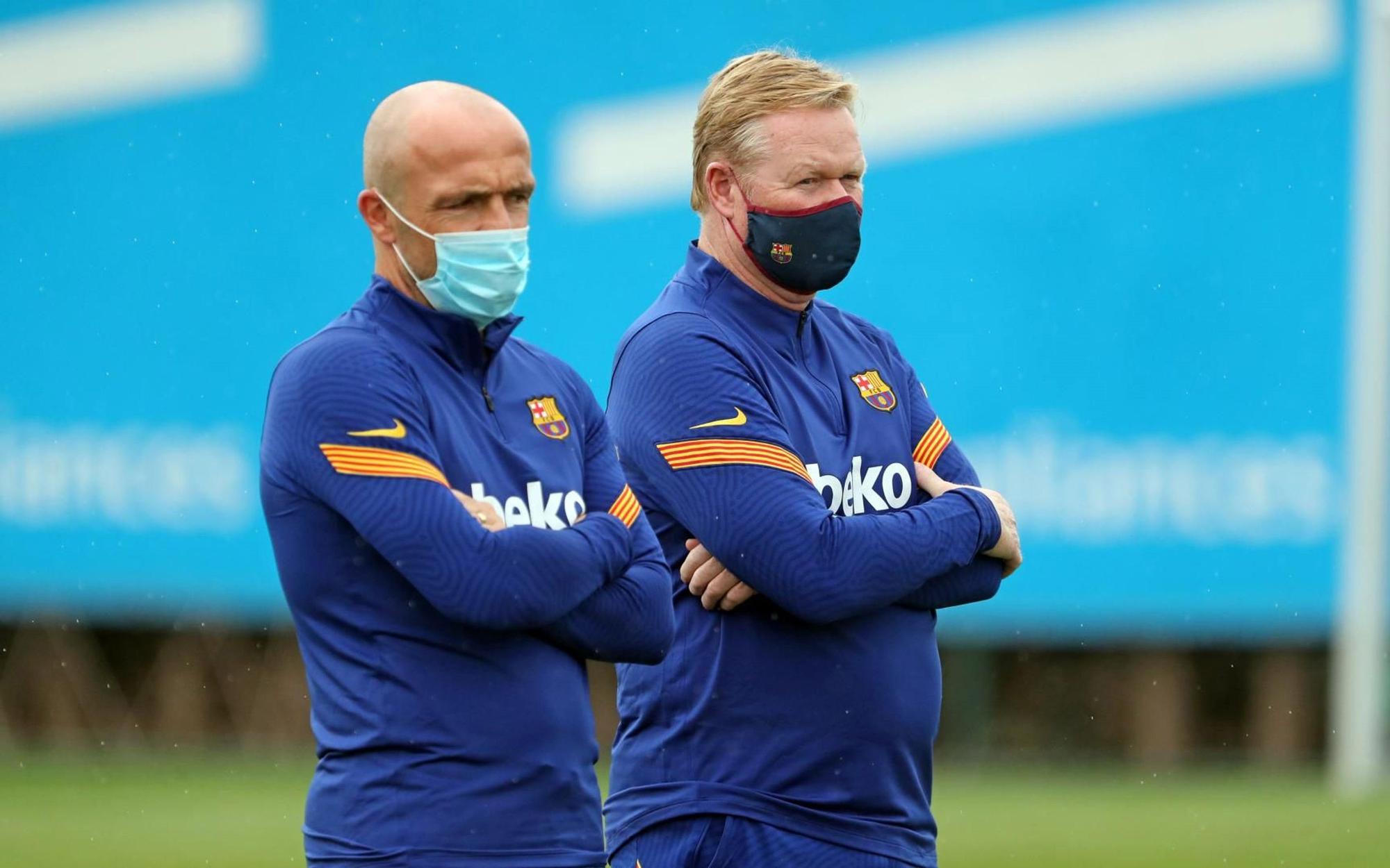 Schreuder y Koeman, en un entrenamiento en la ciudad deportiva del Barça.