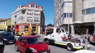 Alerta por un incendio en un edificio de 12 pisos en Vilagarcía