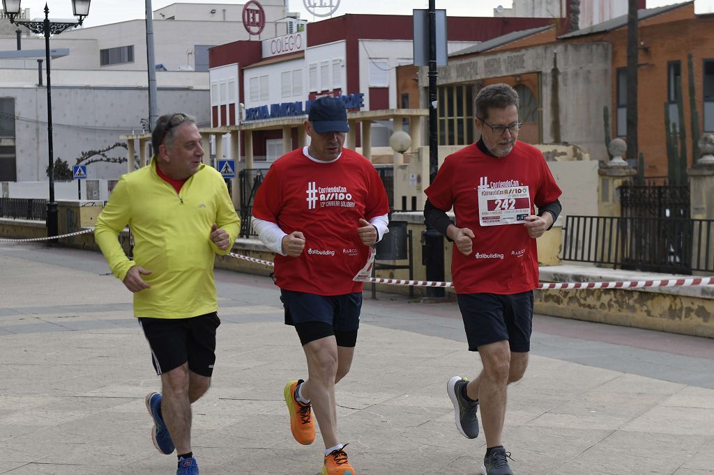 La XIII carrera solidaria Corriendo con Assido, en imágenes