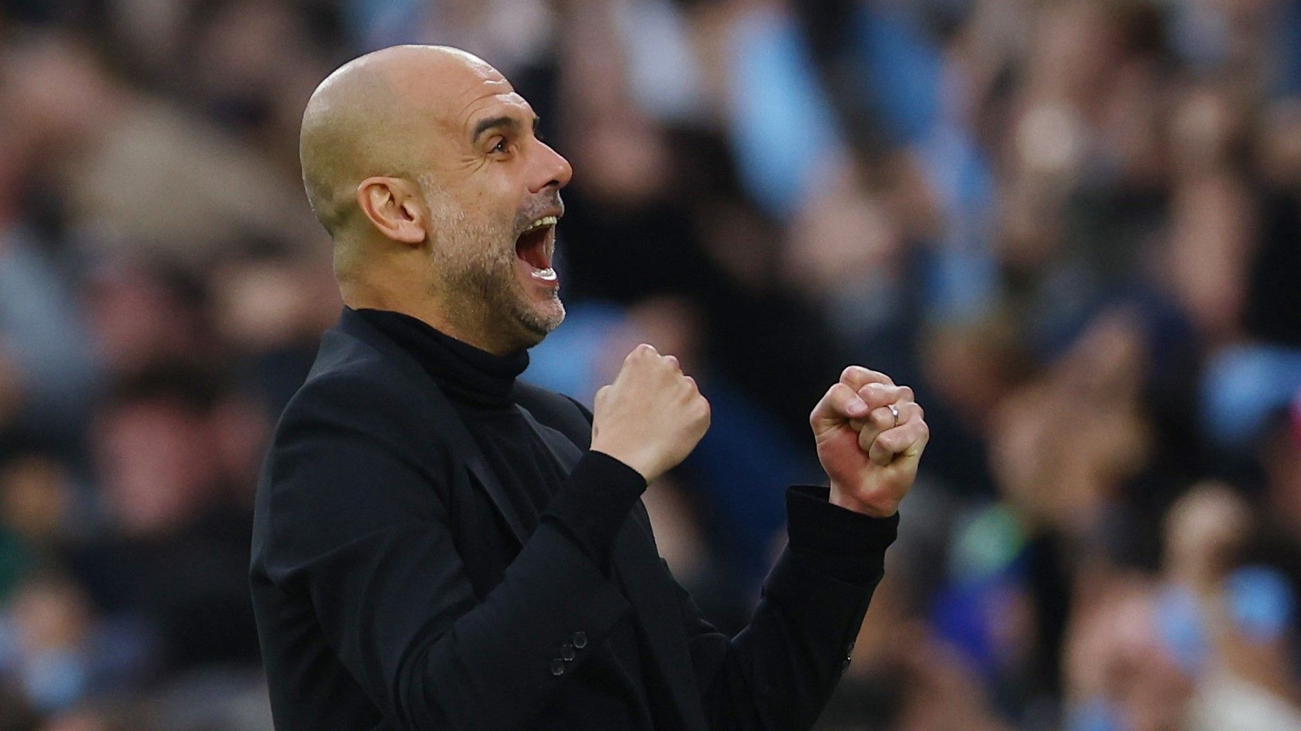 Guardiola celebra uno de los cuatro goles del City al Madrid en Manchester.