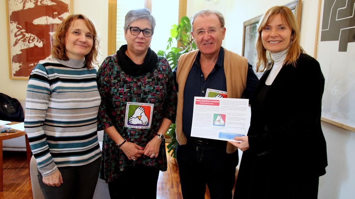 Lluïsa Moret recibe Comisión Promotora de la Iniciativa Legislativa Popular (ILP).