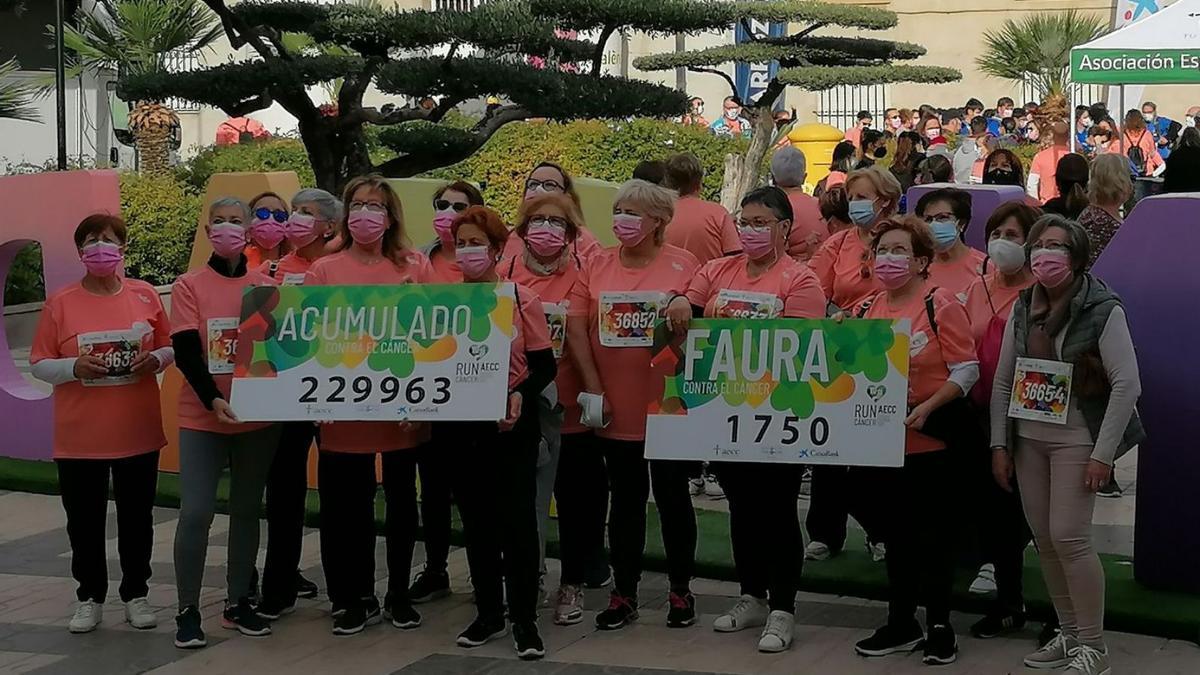 Protagonistas de la carrera contra el cáncer que tuvo lugar en Faura. | LEVANTE-EMV