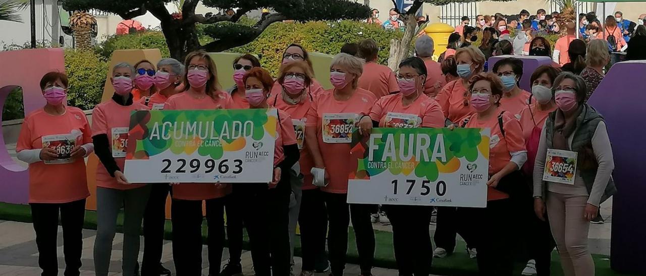 Protagonistas de la carrera contra el cáncer que tuvo lugar en Faura. | LEVANTE-EMV