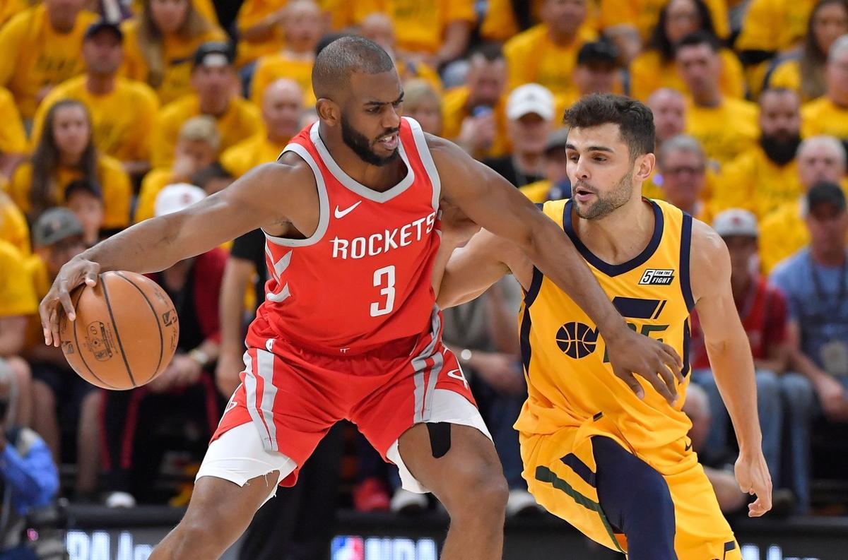 SALT LAKE CITY, UT - MAY 06: Chris Paul #3 of the Houston Rockets controls the ball in front of Raul Neto #25 of the Utah Jazz in the first half during Game Four of Round Two of the 2018 NBA Playoffs at Vivint Smart Home Arena on May 6, 2018 in Salt Lake City, Utah. NOTE TO USER: User expressly acknowledges and agrees that, by downloading and or using this photograph, User is consenting to the terms and conditions of the Getty Images License Agreement.   Gene Sweeney Jr./Getty Images/AFP