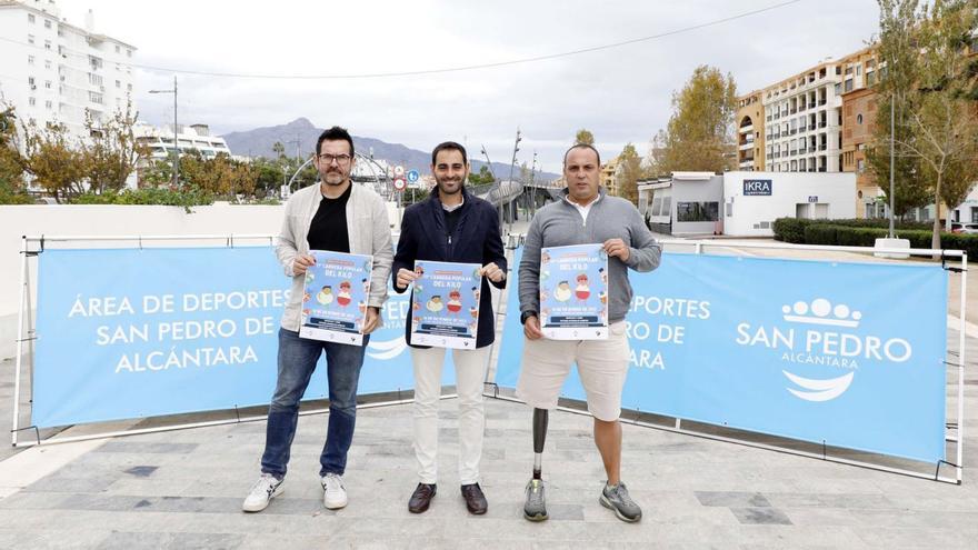 Organizadores de la Carrera del Kilo, ayer, en la presentación de la iniciativa solidaria.