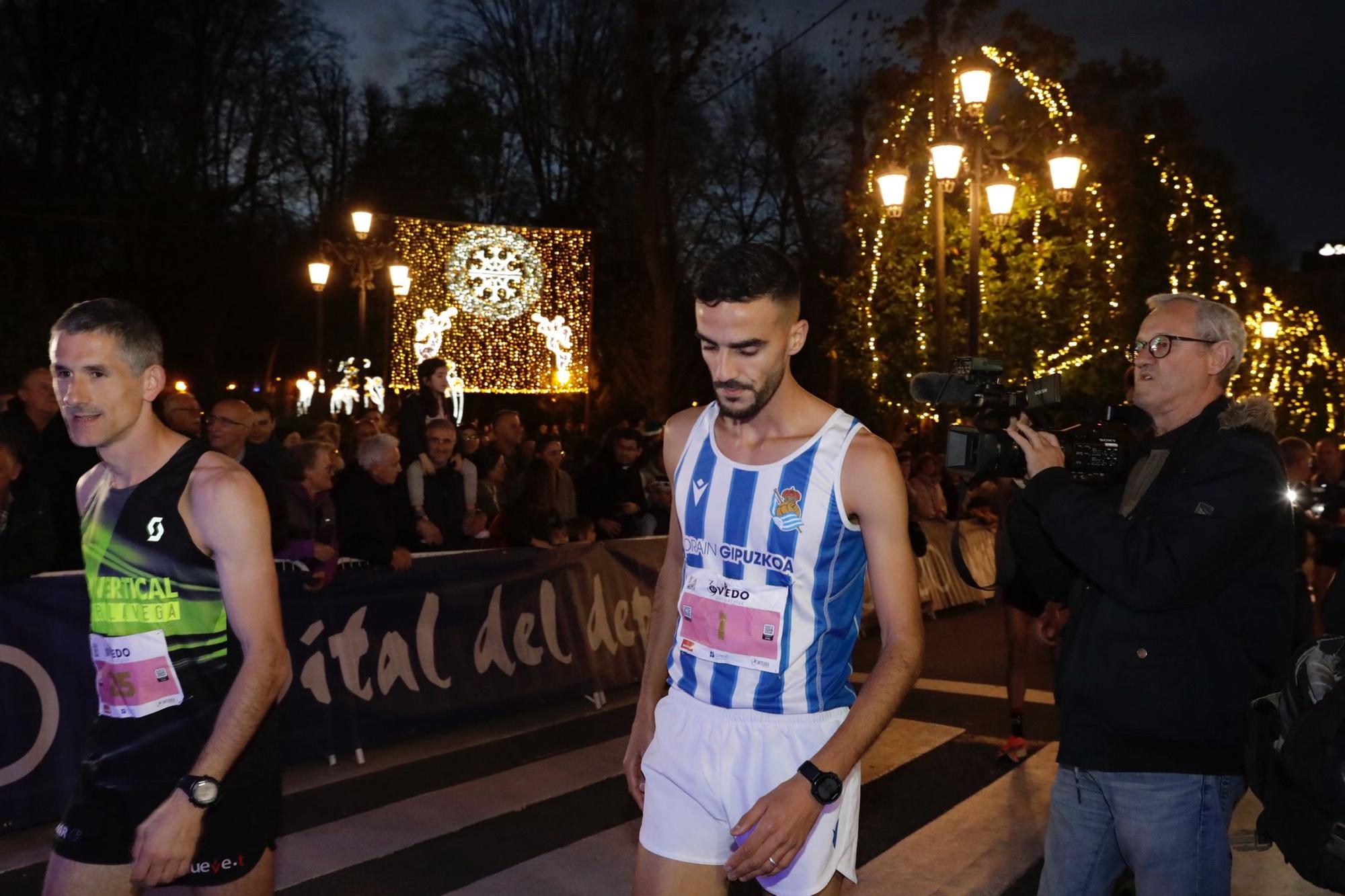 En imágenes: Jaime Bueno (Univerisad de Oviedo) y Mariam Benkert triunfan en la San Silvestre de Oviedo