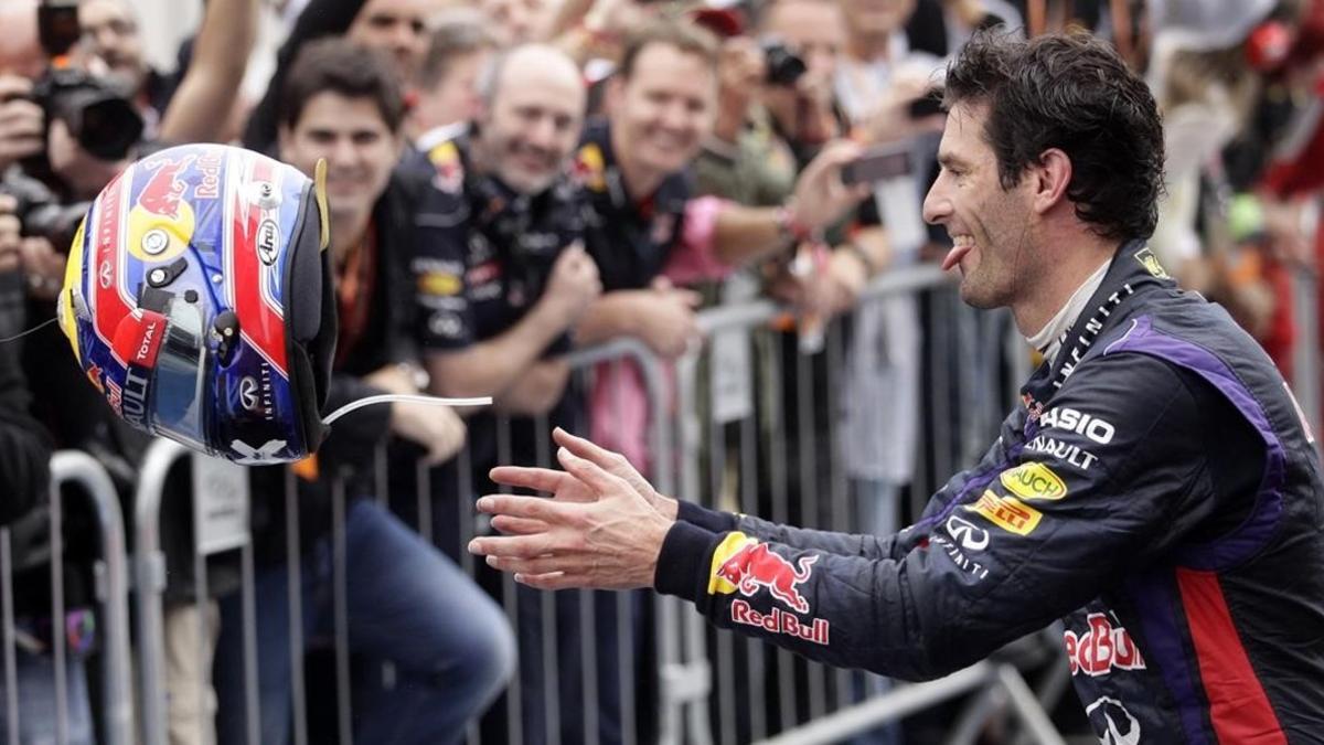 Mark Webber celebra uno de sus podios con el equipo Red Bull.