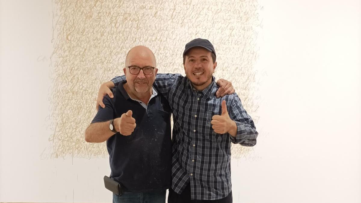 Ginestar y Rahmoun, en la sala de la Lonja de Alicante.