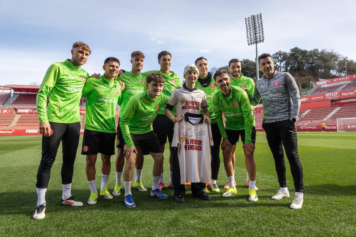 En Biel, amb els jugadors del Girona i Míchel.