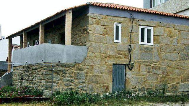 A coñecida como Casa dos Pobres, no entorno do colexio Compañía de María.