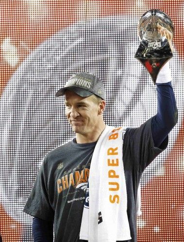 Denver Broncos' quarterback Peyton Manning holds the Vince Lombardi Trophy after the Broncos defeated the Carolina Panthers in the NFL's Super Bowl 50 football game in Santa Clara