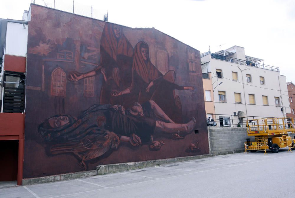 Mural de Milu Correch a l'aparcament del restaurant Can Roca al barri de Taialà