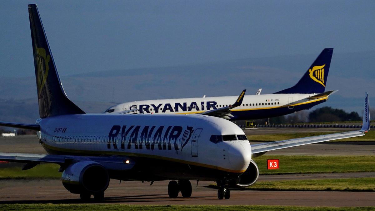FILE PHOTO: Ryanair Boeing 737-800 aircraft taxi at Manchester Airport, Britain.