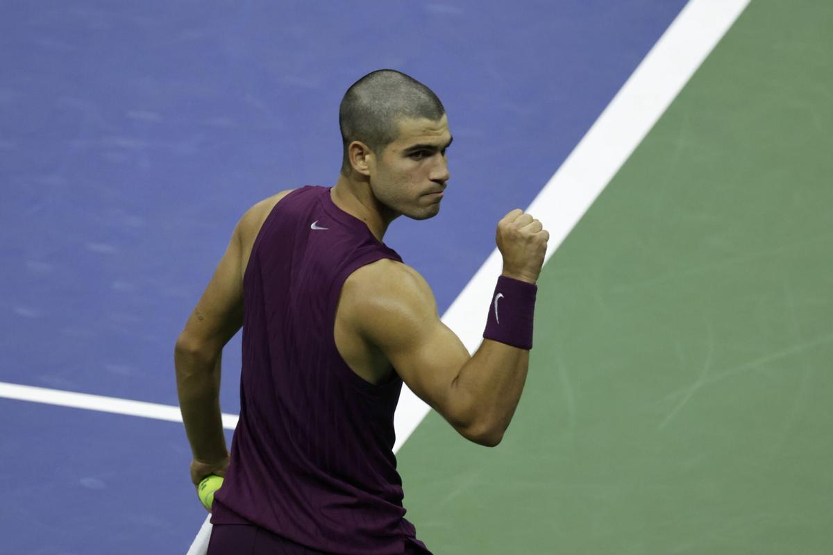 Carlos Alcaraz, of Spain, reacts after defeating Reilly Opelka, of the United States, during the first round of the U.S. Open tennis championships, Monday, Aug. 25, 2025, in New York. (AP Photo/Adam Hunger)