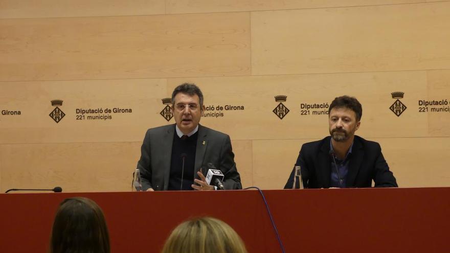 Víctor Puga i Miquel Noguer presentant el Simposi.