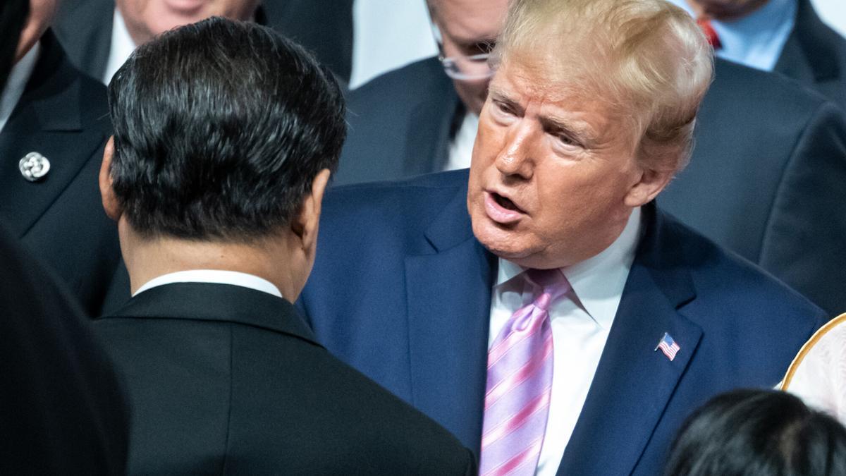 Xi Jinping (I), presidente of China, y Donald Trump, presidente de Estados Unidos.