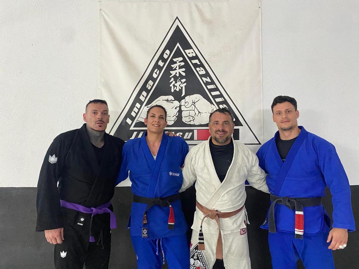 Els tres competidors del club en el Màster (Sergio Clerigues, Míram Pujadas i Juan Antonio Gómez) i l'entrenador Carlos Amigo.