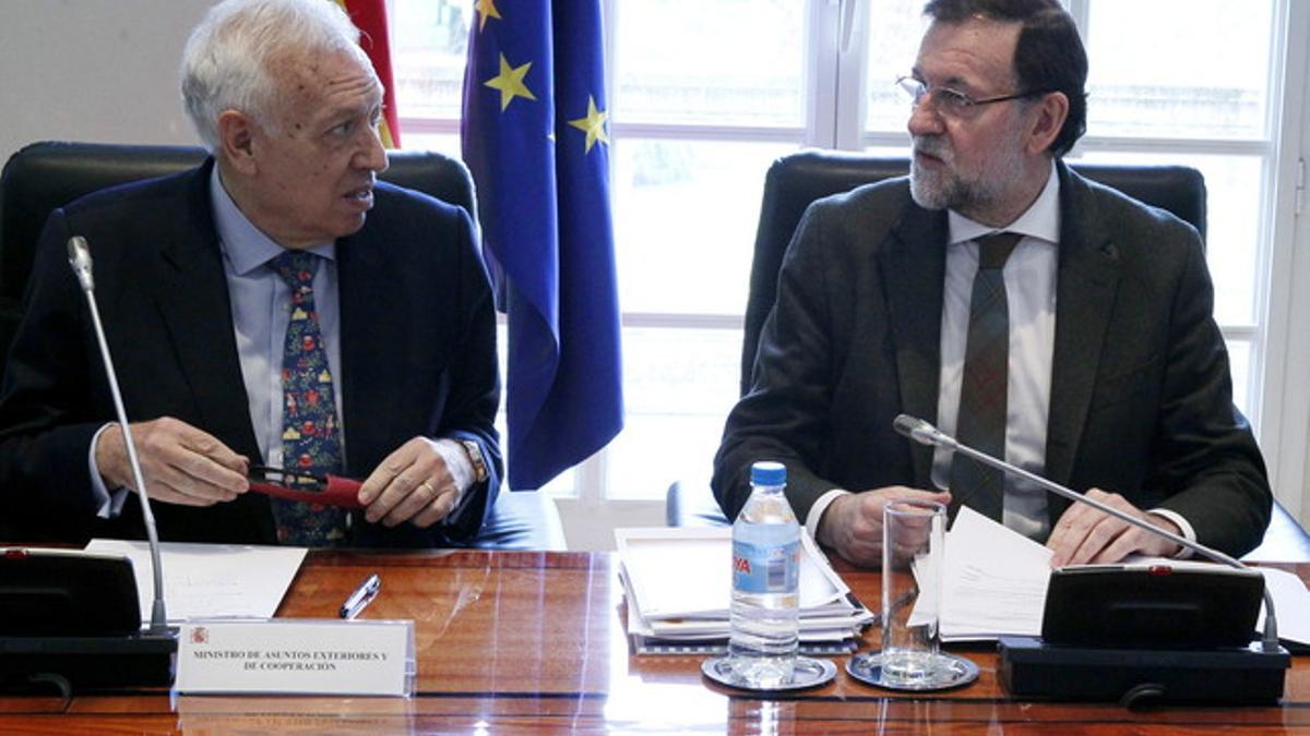 Margallo y Rajoy en el Consejo de Política Exterior.