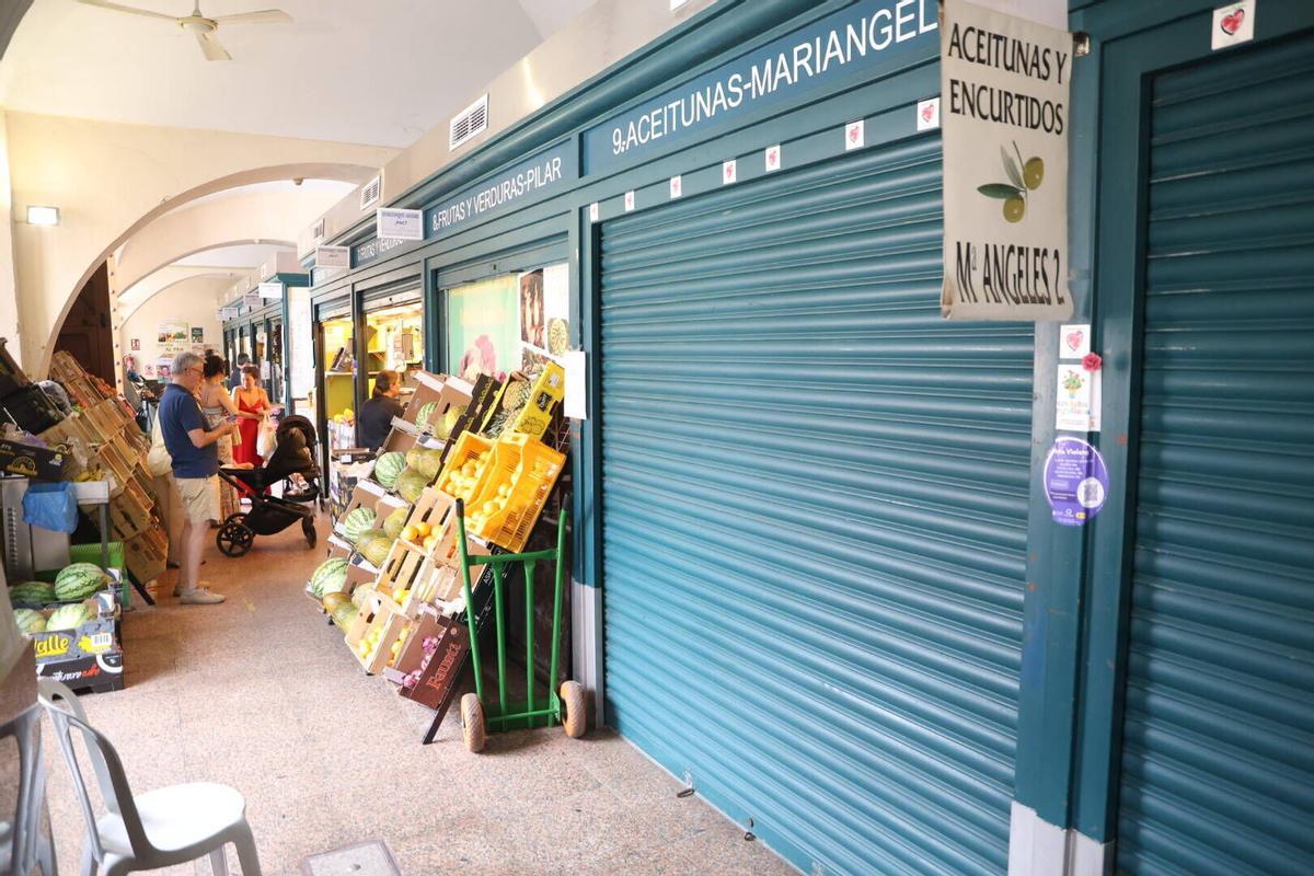 Cordoba, mercado de la corredera, rehabilitación, climatización, comercios cerrados, desperfectos