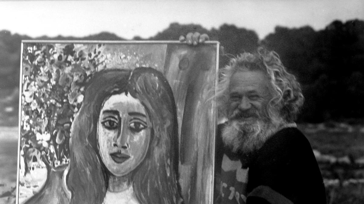 El artista Hans Grass con uno de sus muchos retratos, ‘Die Blumenfrau’, que data de 1970.