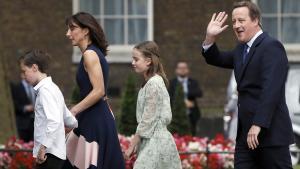 Britain’s outgoing Prime Minister, David Cameron, accompanied by his wife Samantha, daughters Nancy and Florence and son Arthur, prepare to pose for photographs in front of number 10 Downing Street, on his last day in office as Prime Minister, in central London, Britain July 13, 2016.     REUTERS/Stefan Wermuth/File Photo
