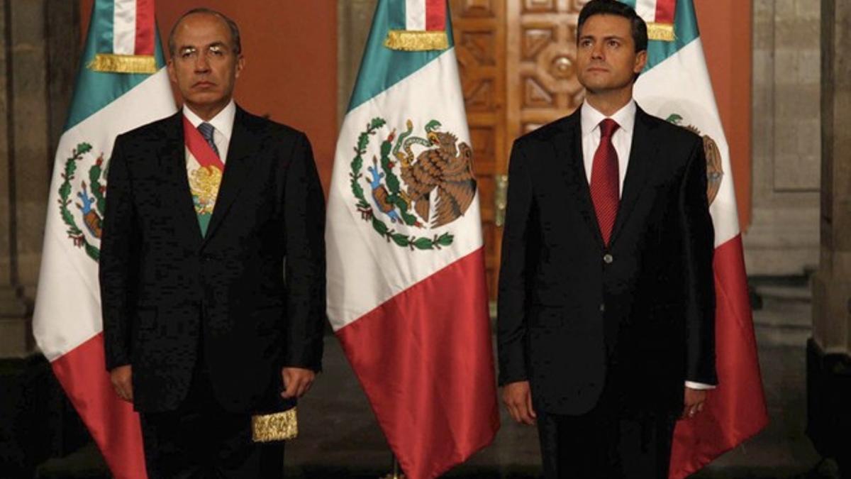 Enrique Peña Nieto y su antecesor Felipe Calderón