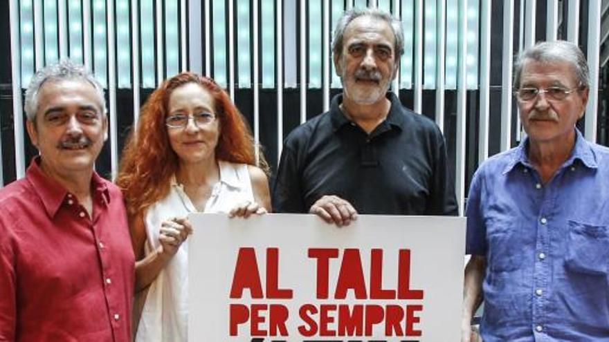 Reig, Crespo, Miralles y Torrent, con el cartel del concierto de Valencia.