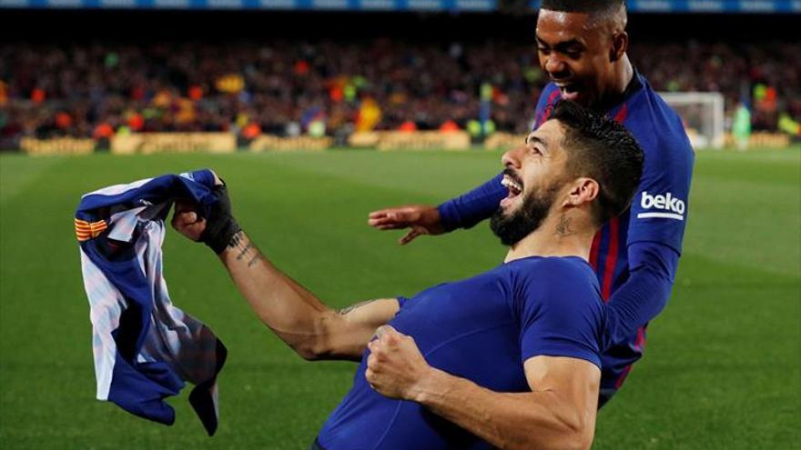 El Barça acaricia la Liga con los goles de Suárez y Messi