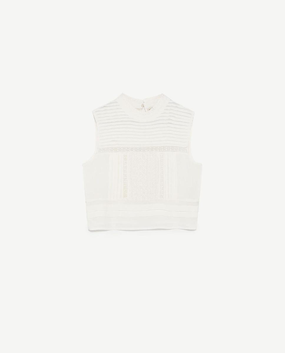 Zara desnuda los hombros: Top con cuello perkins (25,95 euros).