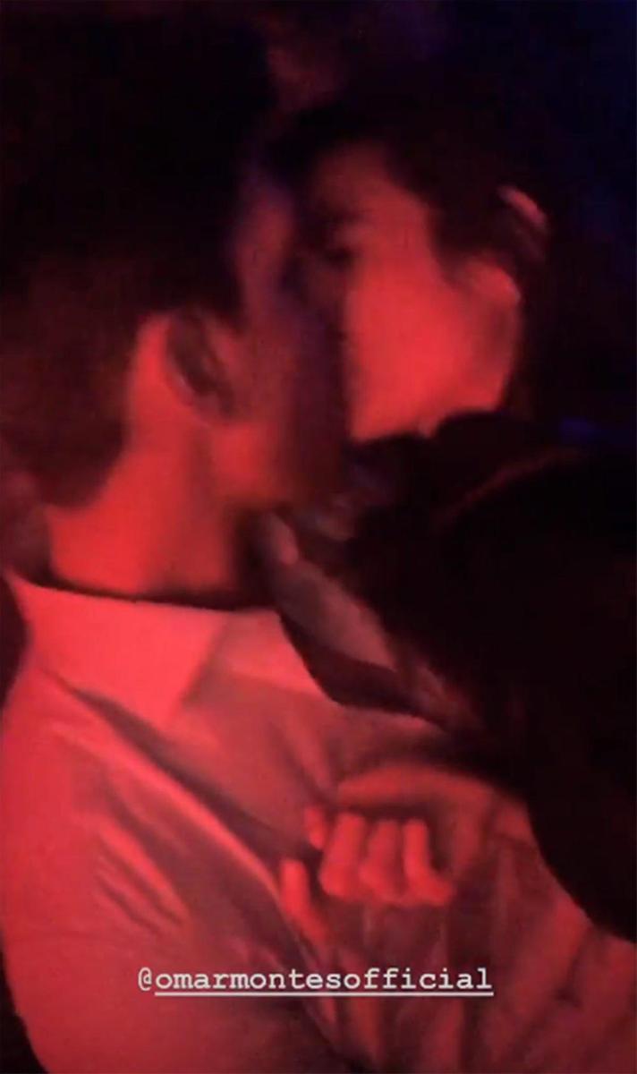 Beso de Diego Matamoros y Estela Grande de fiesta