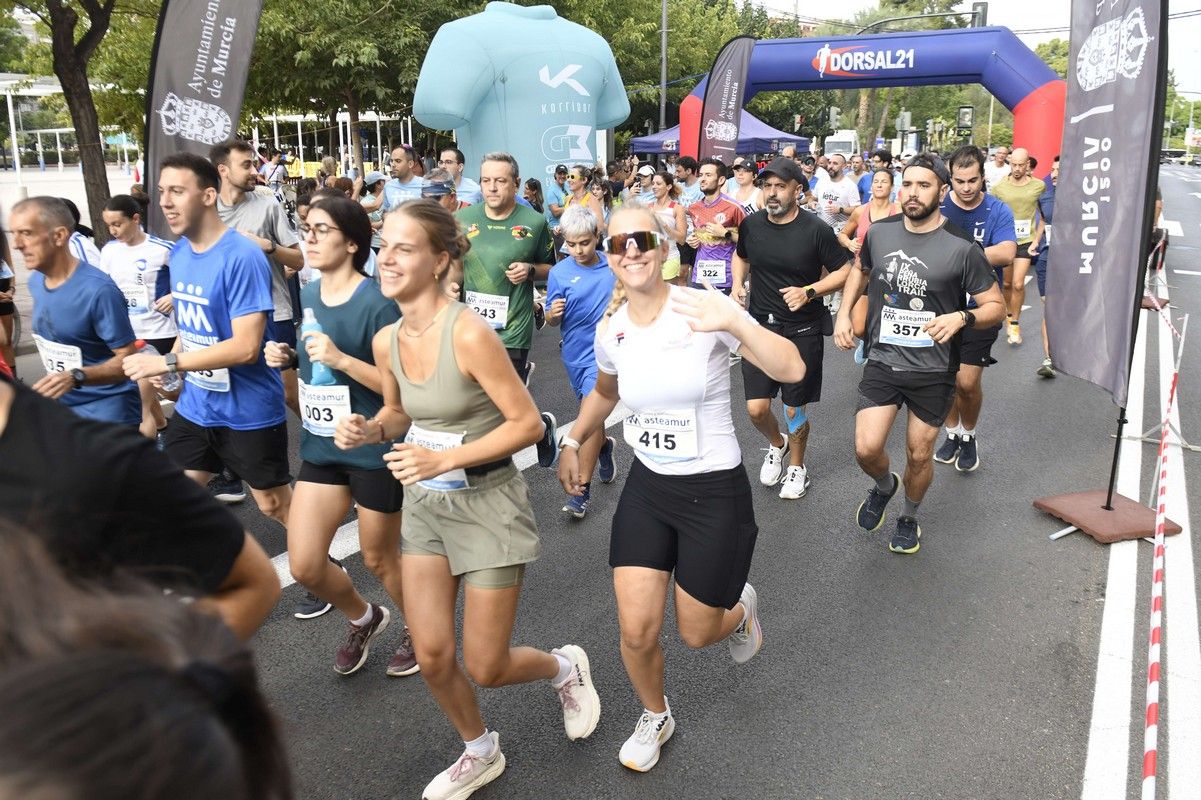 La carrera y marcha Solidaria Asteamur, en imágenes