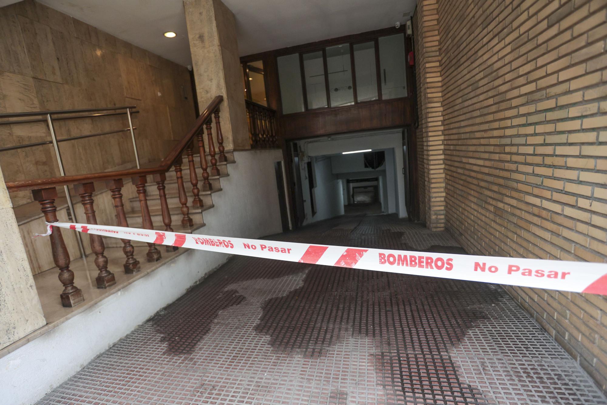 EN IMÁGENES: El derrumbe de una terraza por las lluvias aplasta una academia de baile vacía en Oviedo