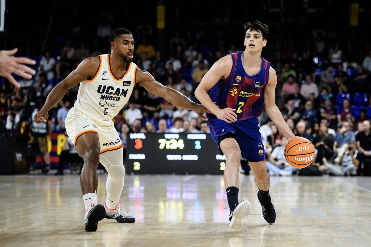 David DeJulius y Juani Marcos, nuevo jugador del UCAM Murcia, durante el play off de la Liga Endesa.