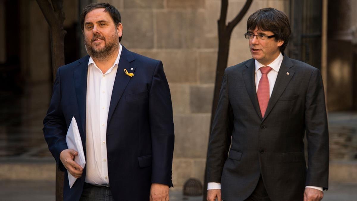 Oriol Junqueras y Carles Pugdemont en la Generalitat.5