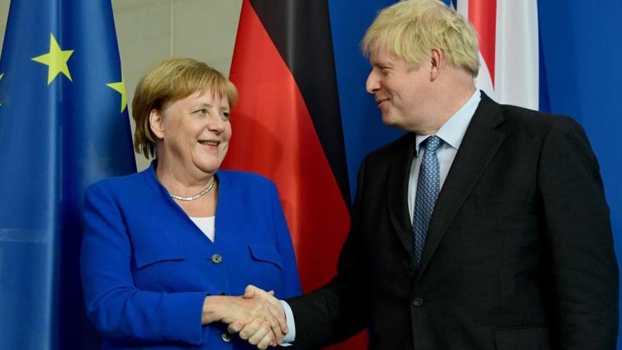 Merkel y Johnson, tras la declaración conjunta.