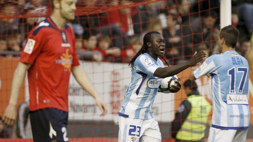 Caicedo y Duda celebran un gol en El Sadar, en el 2-2 de la 2009/10.