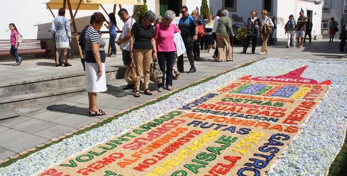 El Corpus de Castropol pudo con el agua